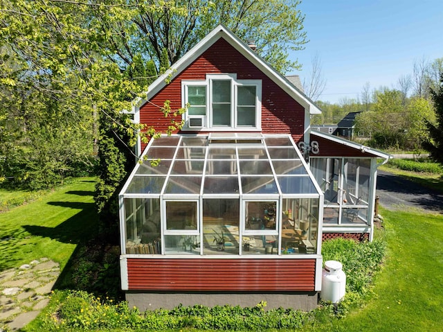 825 S End Rd, North Hero, VT 05457 - back of property featuring a sunroom and a lawn