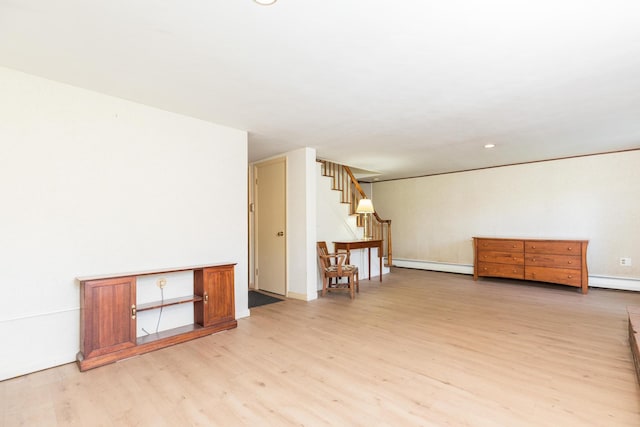 18 Riverdale Ave, Dover, NH 03820 - empty room featuring light wood-type flooring, a baseboard radiator, stairway, and recessed lighting