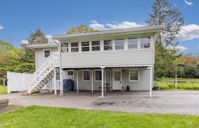 18 Riverdale Ave, Dover, NH 03820 - rear view of house featuring a patio area and stairs