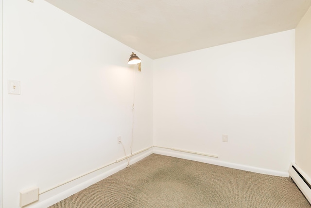 18 Riverdale Ave, Dover, NH 03820 - empty room with baseboard heating, carpet flooring, and baseboards