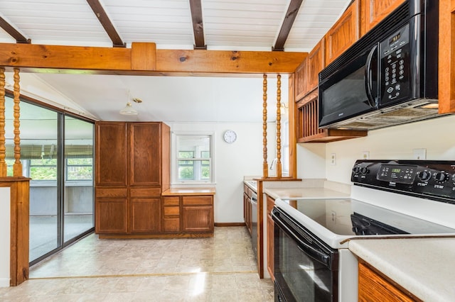 18 Riverdale Ave, Dover, NH 03820 - kitchen featuring range with electric cooktop, black microwave, plenty of natural light, and light countertops