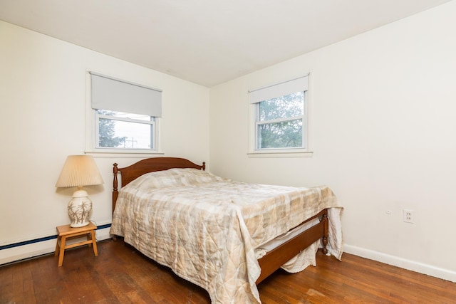 18 Riverdale Ave, Dover, NH 03820 - bedroom featuring multiple windows, wood finished floors, and baseboards
