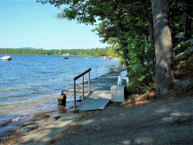 113 Oak Ln Unit 113, Wakefield, NH 03830 - dock with a water view and a wooded view