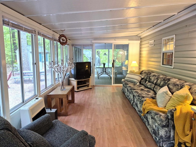113 Oak Ln Unit 113, Wakefield, NH 03830 - sunroom / solarium featuring wooden walls, wood finished floors, and a wall mounted air conditioner