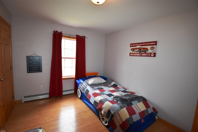 3900 Jersey St, Panton, VT 05491 - bedroom with baseboard heating and light wood finished floors