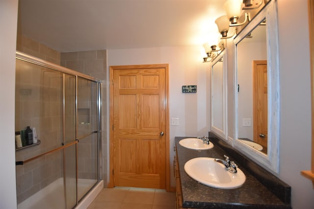 3900 Jersey St, Panton, VT 05491 - bathroom featuring a stall shower, double vanity, and tile patterned floors