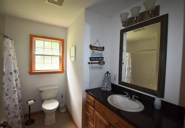 3900 Jersey St, Panton, VT 05491 - bathroom with vanity, toilet, baseboards, and a shower with curtain