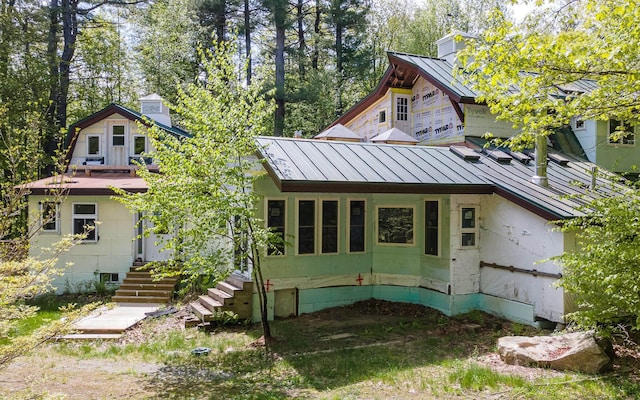 319 W Lake Rd, Fitzwilliam, NH 03447 - back of house with a standing seam roof, a chimney, and metal roof