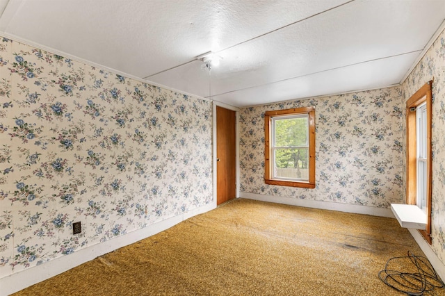 25 Eames St, Northumberland, NH 03582 - unfurnished room with carpet floors, a textured ceiling, and wallpapered walls