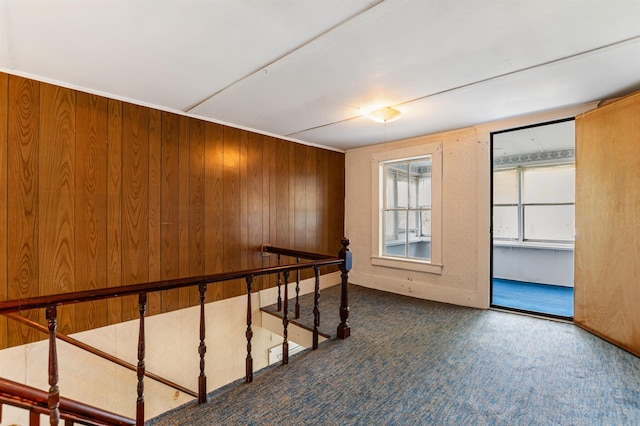 25 Eames St, Northumberland, NH 03582 - empty room with wooden walls and carpet flooring