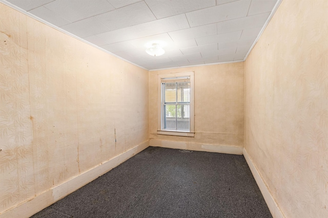 25 Eames St, Northumberland, NH 03582 - empty room featuring dark carpet, ornamental molding, and baseboards