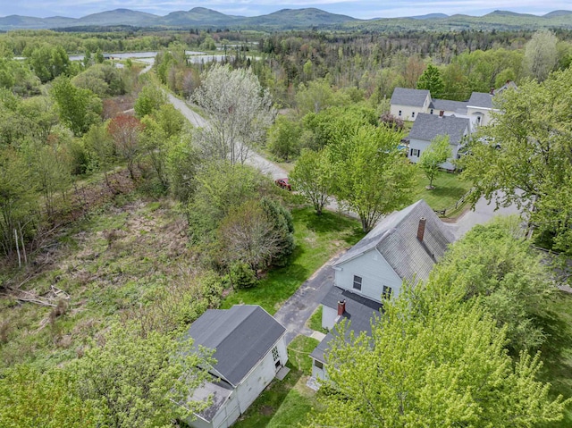25 Eames St, Northumberland, NH 03582 - aerial view of property and surrounding area with a mountain backdrop and a heavily wooded area