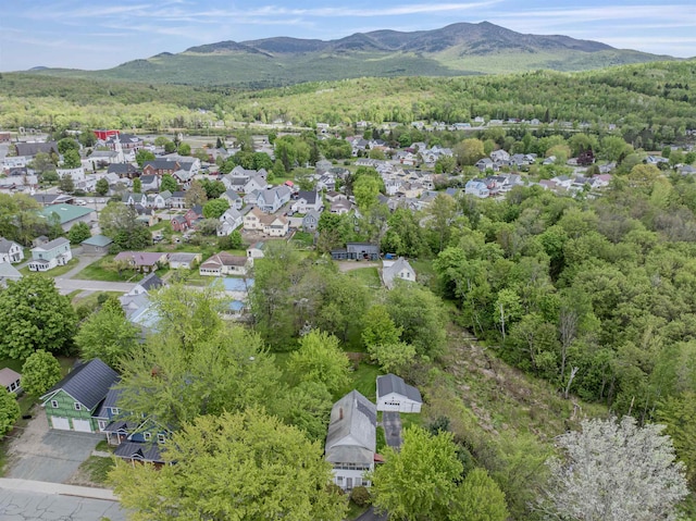 25 Eames St, Northumberland, NH 03582 - aerial view of residential area featuring a mountainous background and a forest