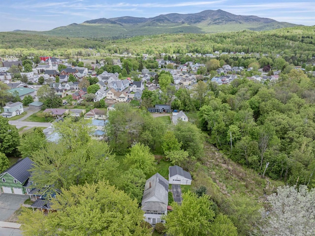 25 Eames St, Northumberland, NH 03582 - aerial view of residential area with a mountain backdrop and a forest
