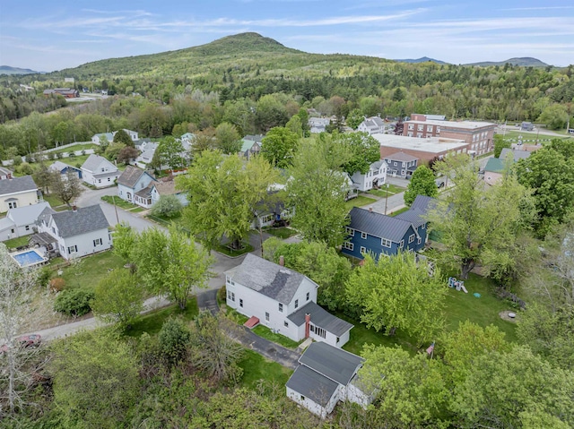 25 Eames St, Northumberland, NH 03582 - aerial perspective of suburban area with a forest and mountains