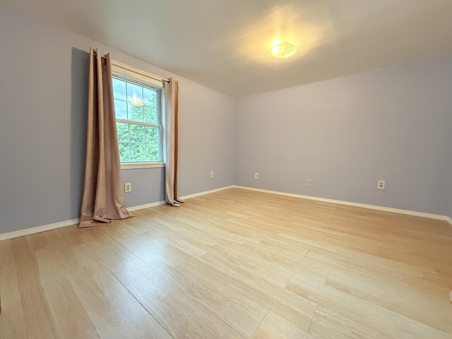 19 Gambier St, Claremont, NH 03743 - spare room featuring light wood-type flooring and baseboards