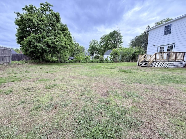 19 Gambier St, Claremont, NH 03743 - view of yard featuring a wooden deck and french doors