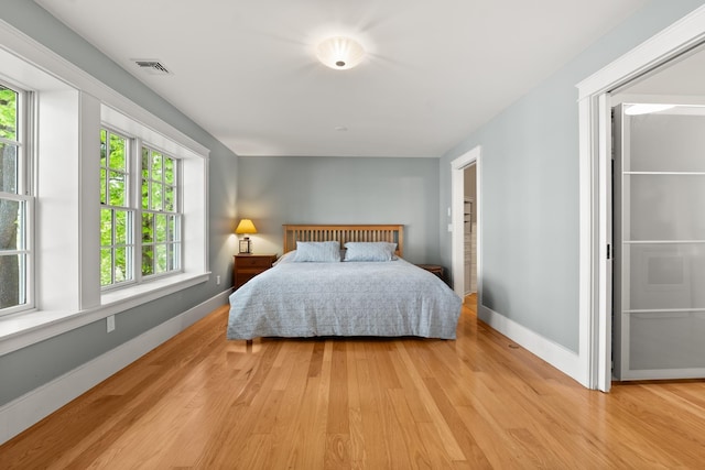 8 Wisteria Ln, Eliot, ME 03903 - bedroom with light wood-style floors and baseboards