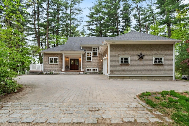 8 Wisteria Ln, Eliot, ME 03903 - view of front facade with roof with shingles and driveway