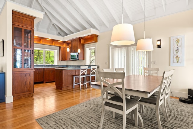 8 Wisteria Ln, Eliot, ME 03903 - dining room with light wood finished floors and wooden ceiling