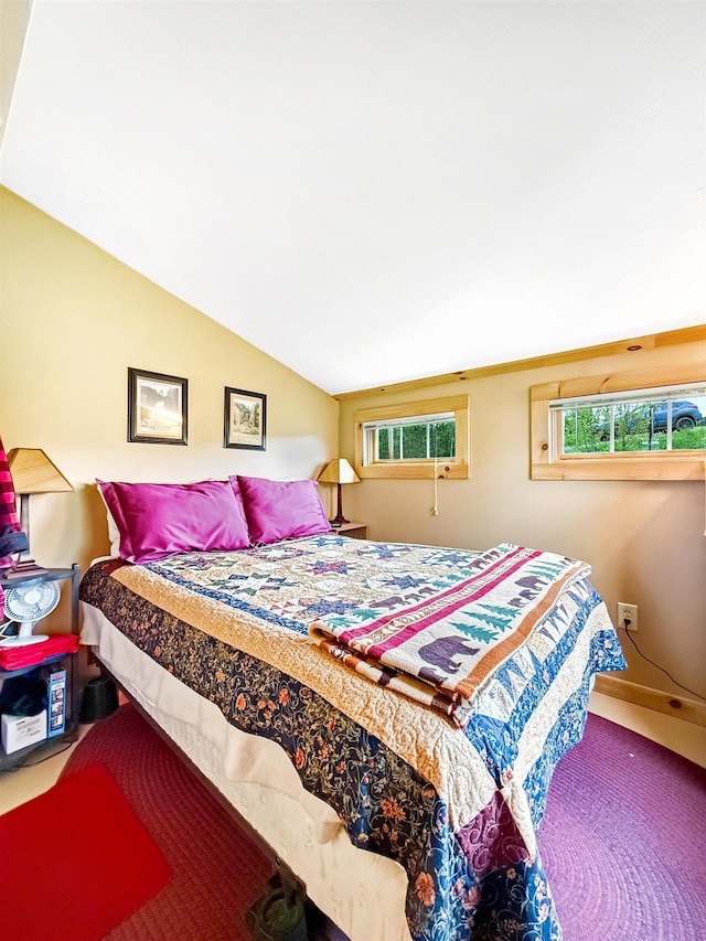 718 Reed Rd, Colebrook, NH 03576 - bedroom with lofted ceiling and carpet