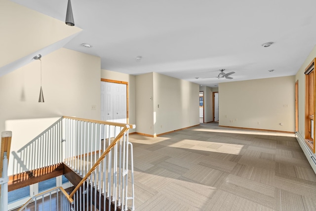 430 Clearwater Rd, Shelburne, VT 05482 - hallway featuring carpet floors, baseboards, and an upstairs landing