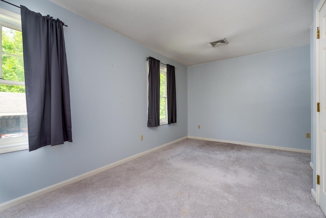 1 Village Falls Way Unit 1, Merrimack, NH 03054 - carpeted spare room featuring baseboards