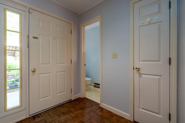 1 Village Falls Way Unit 1, Merrimack, NH 03054 - foyer entrance featuring baseboards, a baseboard heating unit, and plenty of natural light