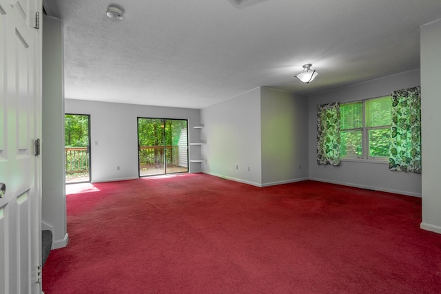 1 Village Falls Way Unit 1, Merrimack, NH 03054 - carpeted spare room featuring baseboards and a smoke detector