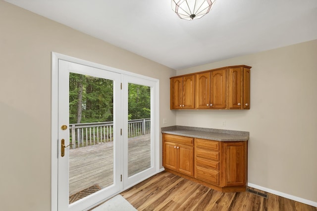 406 Lower Ridge Rd, Loudon, NH 03307 - bar with light wood-type flooring and baseboards