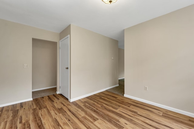 406 Lower Ridge Rd, Loudon, NH 03307 - empty room with light wood-style floors and baseboards