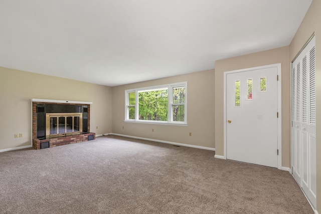 406 Lower Ridge Rd, Loudon, NH 03307 - unfurnished living room with carpet, plenty of natural light, baseboards, and a fireplace