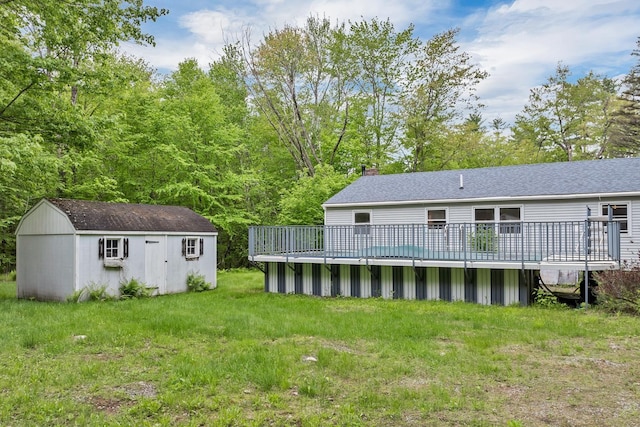 406 Lower Ridge Rd, Loudon, NH 03307 - rear view of house with a wooden deck, a chimney, and roof with shingles
