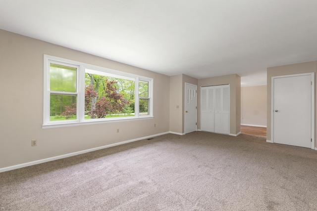 406 Lower Ridge Rd, Loudon, NH 03307 - unfurnished bedroom featuring baseboards and carpet floors