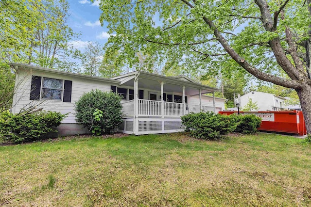 29 Laurel St, Goffstown, NH 03045 - rear view of house featuring a yard