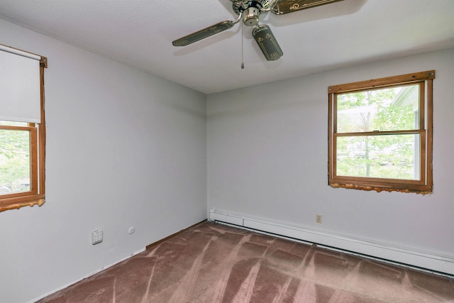 29 Laurel St, Goffstown, NH 03045 - carpeted spare room with a baseboard heating unit, a ceiling fan, and plenty of natural light