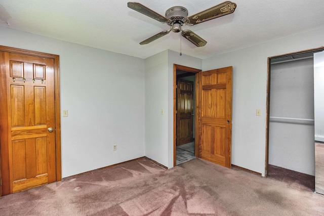 29 Laurel St, Goffstown, NH 03045 - unfurnished bedroom featuring carpet flooring, a closet, baseboards, and ceiling fan