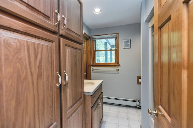 29 Laurel St, Goffstown, NH 03045 - bathroom featuring baseboard heating, tile patterned floors, vanity, and recessed lighting