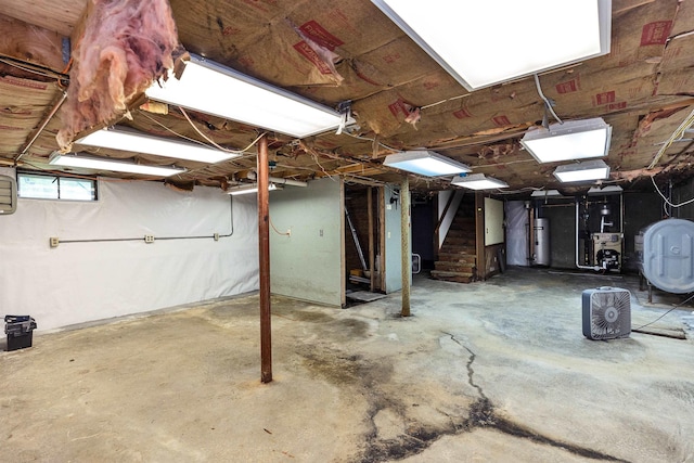 29 Laurel St, Goffstown, NH 03045 - basement with heating fuel, gas water heater, and stairway