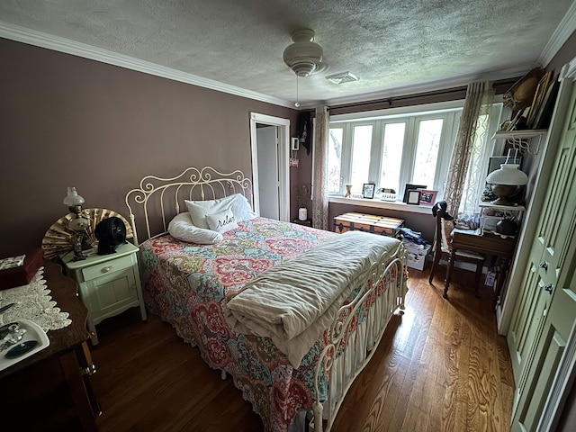 68 N Lowell Rd, Windham, NH 03087 - bedroom featuring wood finished floors, a textured ceiling, ornamental molding, and a ceiling fan