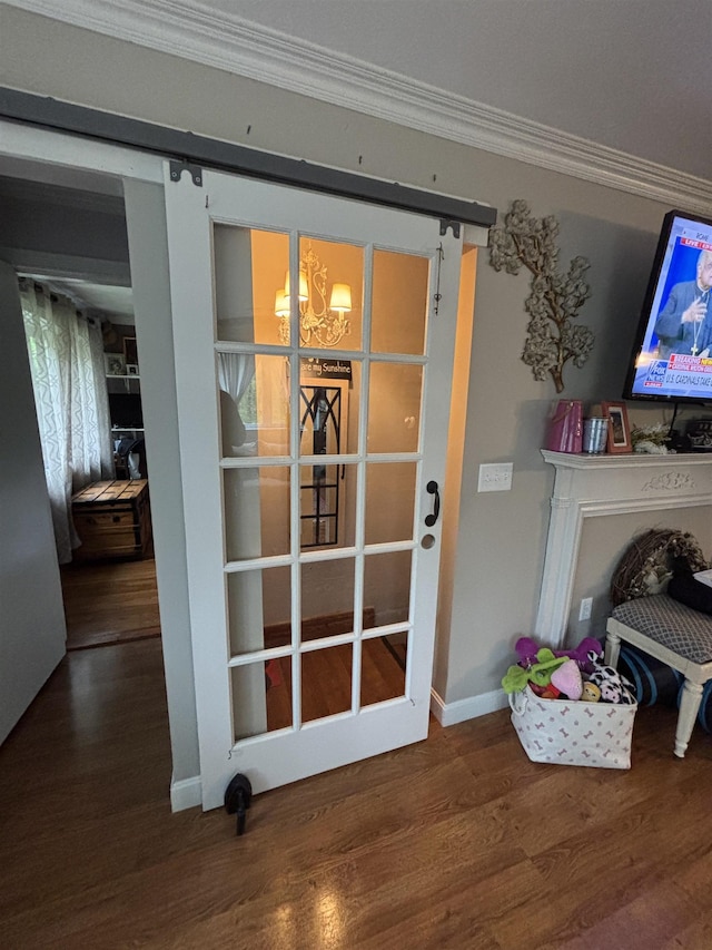 68 N Lowell Rd, Windham, NH 03087 - doorway featuring wood finished floors, crown molding, and baseboards