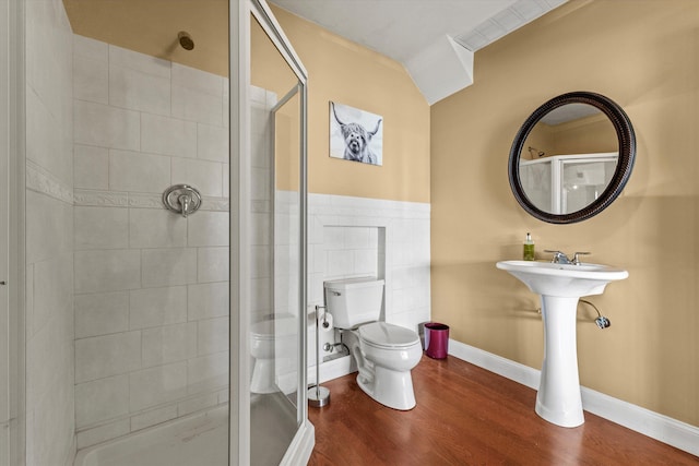 5 Smithfield Ln, Bedford, NH 03110 - bathroom featuring toilet, a shower stall, wood finished floors, and baseboards