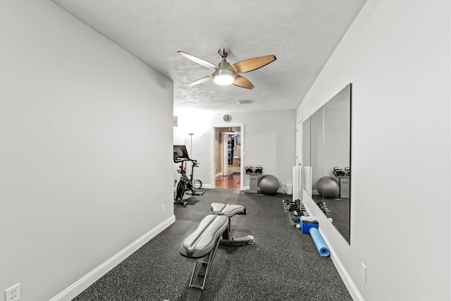 5 Smithfield Ln, Bedford, NH 03110 - workout area with ceiling fan, baseboards, and a textured ceiling