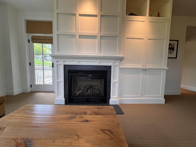 102 Forest Drive 310Interval I W/Lockout 308, Warren, VT 05674 - detailed view of carpet flooring, baseboards, and a fireplace with flush hearth