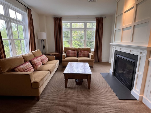 102 Forest Drive 310Interval I W/Lockout 308, Warren, VT 05674 - living room with a glass covered fireplace and carpet