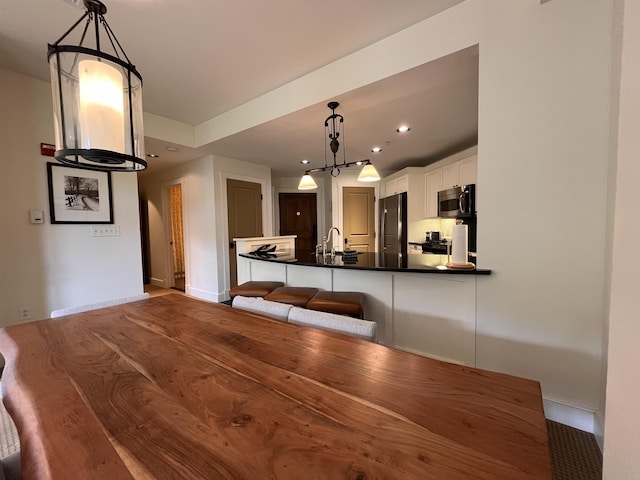 102 Forest Drive 310Interval I W/Lockout 308, Warren, VT 05674 - unfurnished dining area with baseboards, a sink, and recessed lighting
