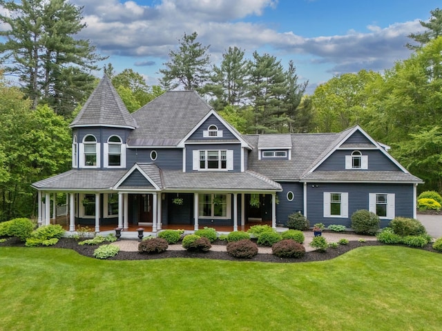 52 Hardy Rd, Bedford, NH 03110 - view of front facade with a front lawn and covered porch