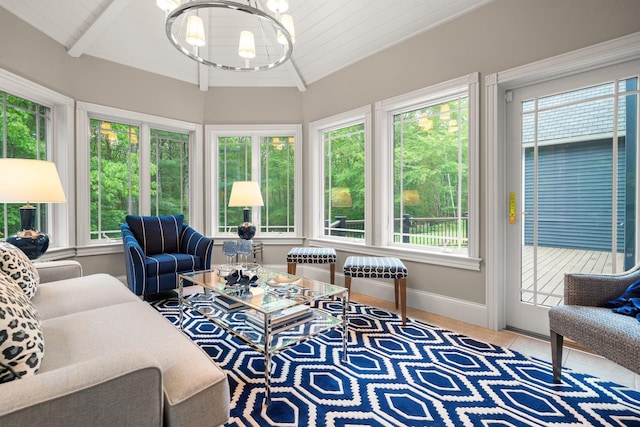 52 Hardy Rd, Bedford, NH 03110 - sunroom featuring plenty of natural light, a chandelier, baseboards, lofted ceiling, and tile patterned flooring