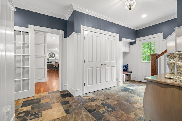 52 Hardy Rd, Bedford, NH 03110 - foyer with stone tile flooring and ornamental molding