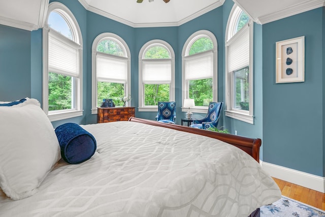 52 Hardy Rd, Bedford, NH 03110 - bedroom featuring baseboards, wood finished floors, ornamental molding, and ceiling fan